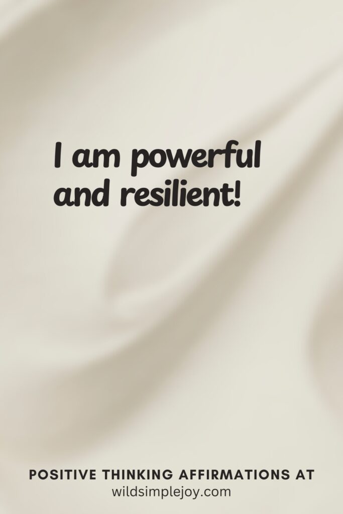 Vertical pin image on cream background with text overlay, I am powerful and resilient! Positive Thinking Affirmations at wildsimplejoy.com