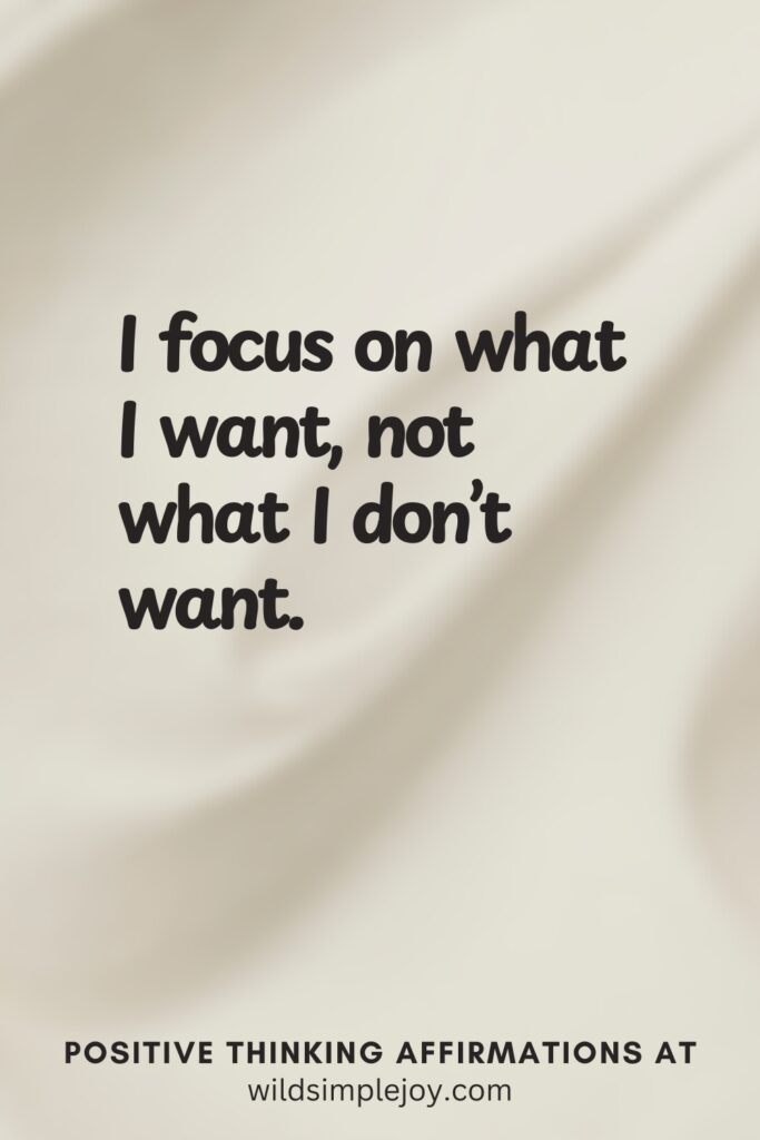 Vertical pin image on cream background with text overlay, I focus on what I want, not on what I don't want. Positive Thinking Affirmations at wildsimplejoy.com