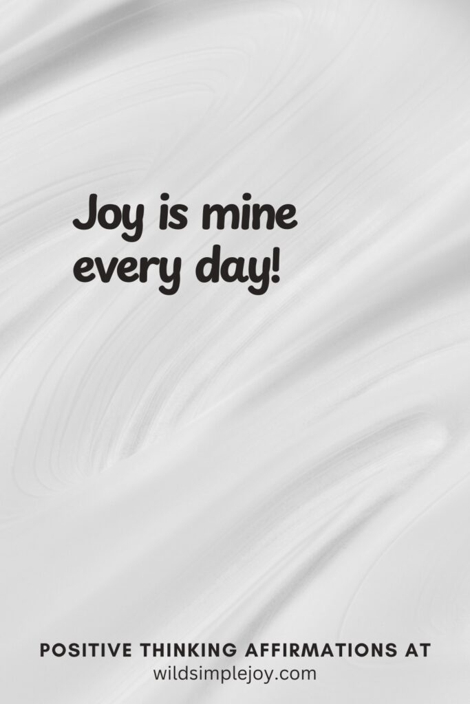 Vertical pin image on cream background with text overlay, Joy is mine every day! Positive Thinking Affirmations at wildsimplejoy.com