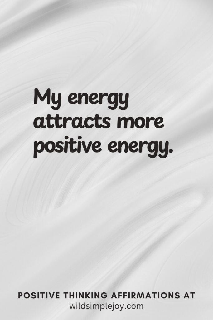 Vertical pin image on cream background with text overlay, My energy attracts more positive energy. Positive Thinking Affirmations at wildsimplejoy.com