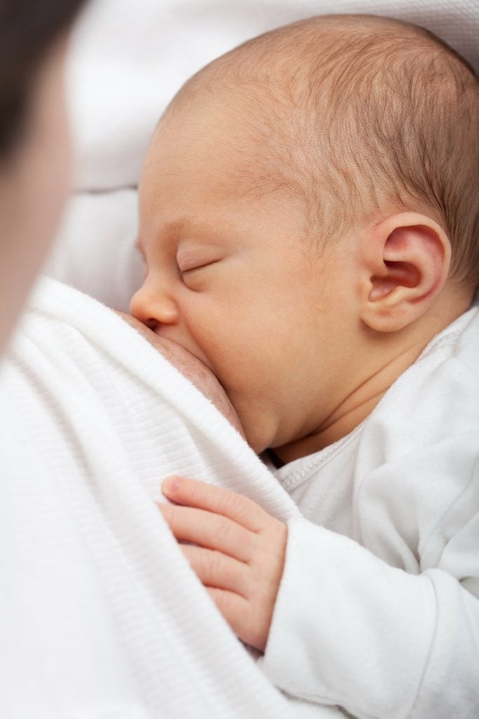 Having your baby breastfeed is an answer to how to clear blocked milk ducts.