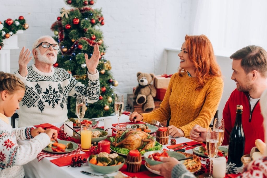 Woman using affirmations for family as father gives thanks.