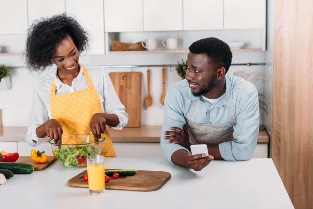 Woman smiling because she knows how to be a supportive partner to her spouse.