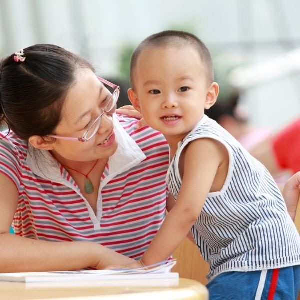 Compassionate mom is helping her son learn