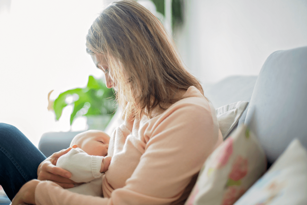 Woman breastfeeding baby, wondering if she needs affirmations to stop breastfeeding