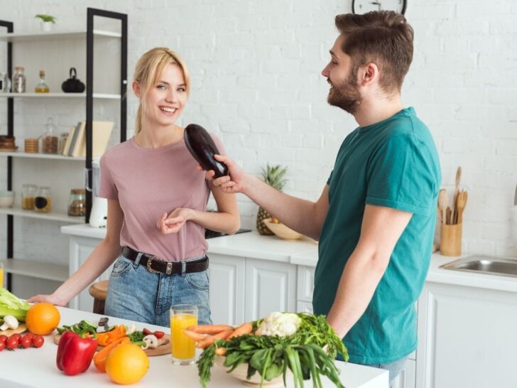 Couple in kitchen talking about their Arbonne 30 Days to Healthy Living Review