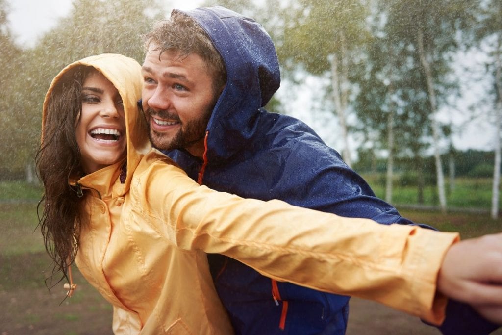 Young woman and man feeling joyful, using affirmations for joy!