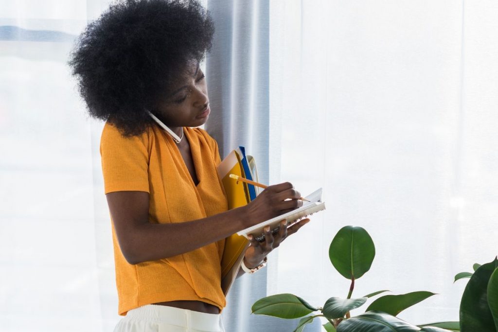 Woman is focused on work from using Arbonne Mind Health.