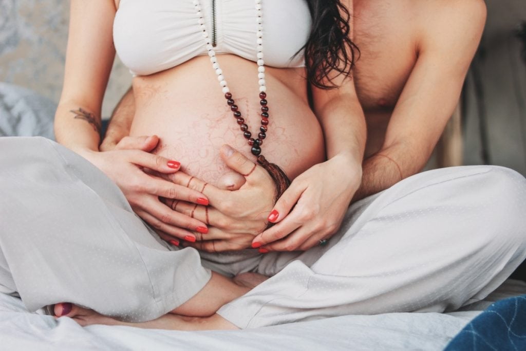 Woman Wearing Fertility Mala Beads for Fertility and Feminine Energy