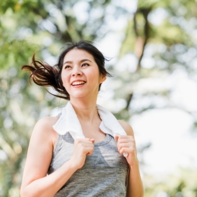 Woman exercising outdoors. Keeping healthy is imporant for our inner peace