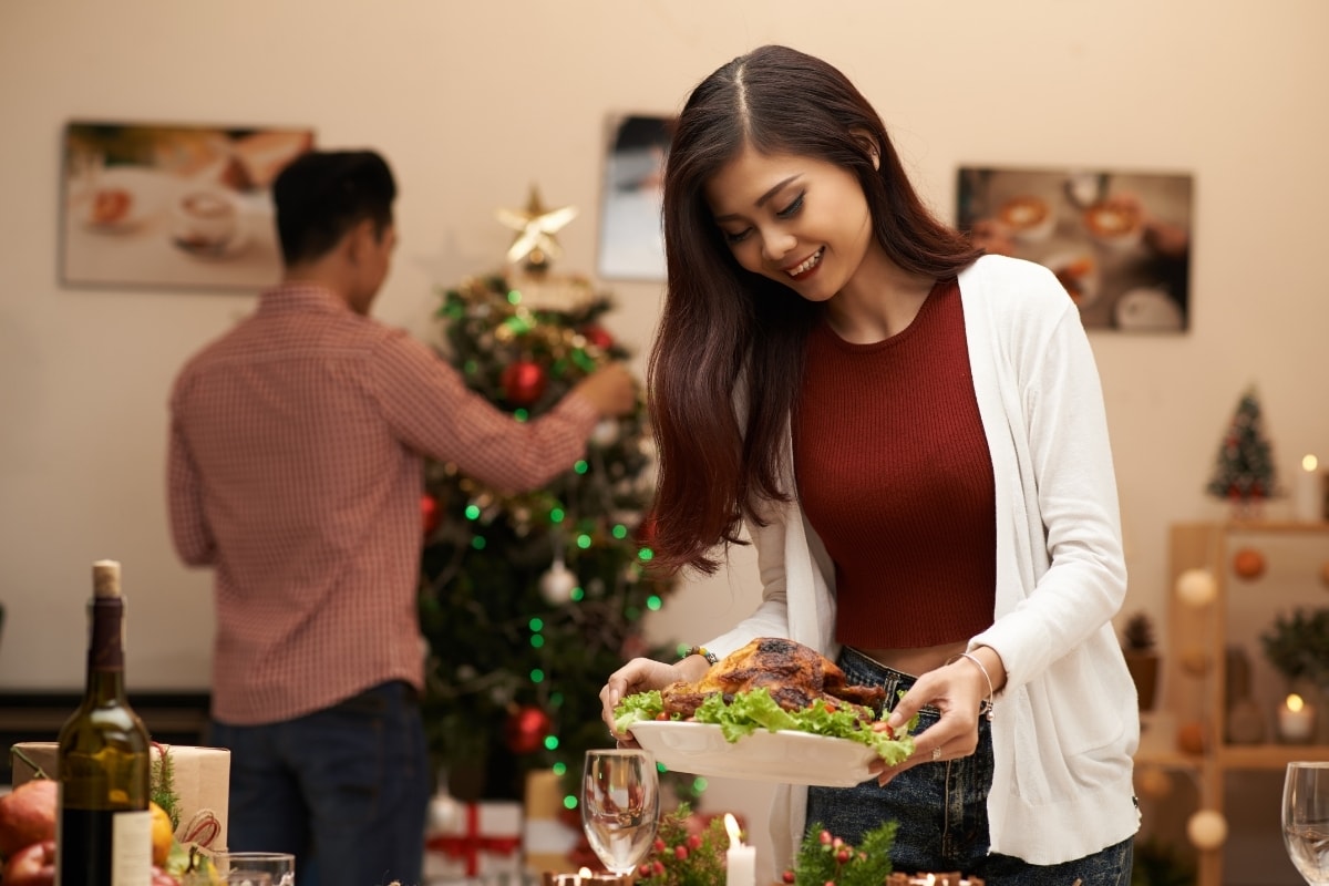 Woman serving healthy holiday foods