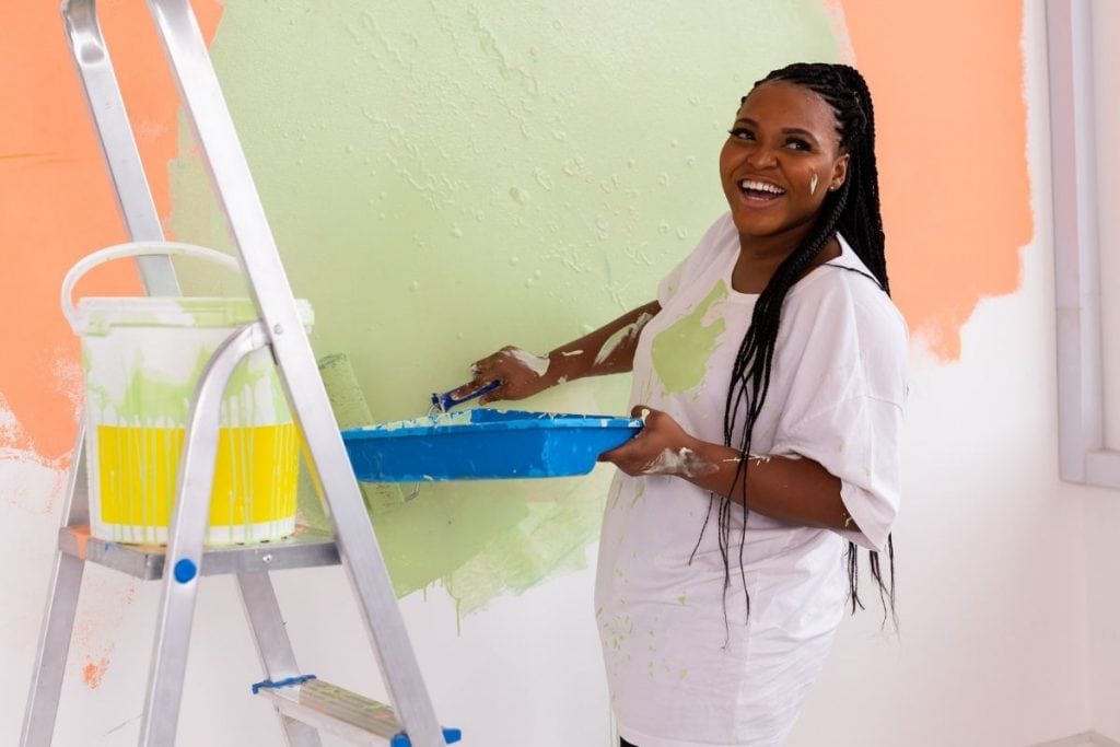 Woman painting after practicing creative affirmations