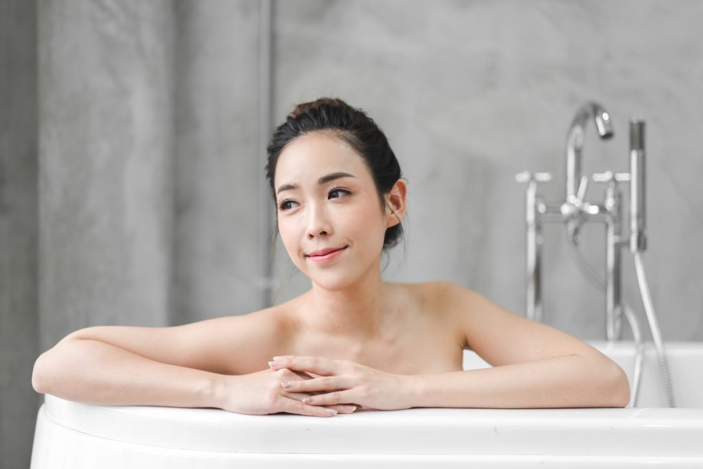 Woman relaxing in an epsom salt bath