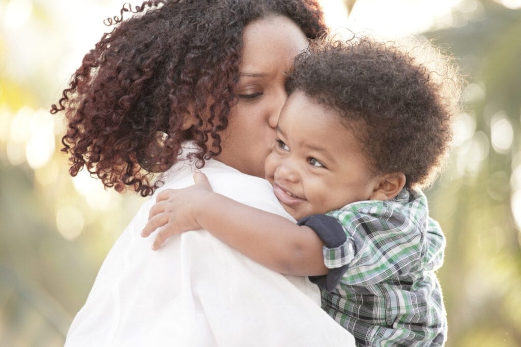 This mother hugging her son knows how to love unconditionally