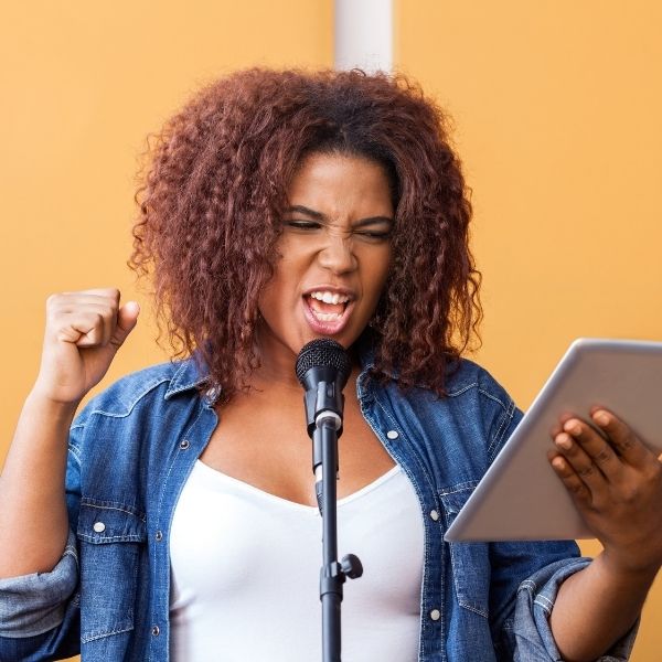 Woman performing slam poetry