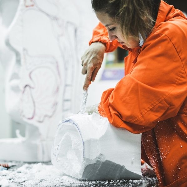 Woman carving and expressing herself creatively