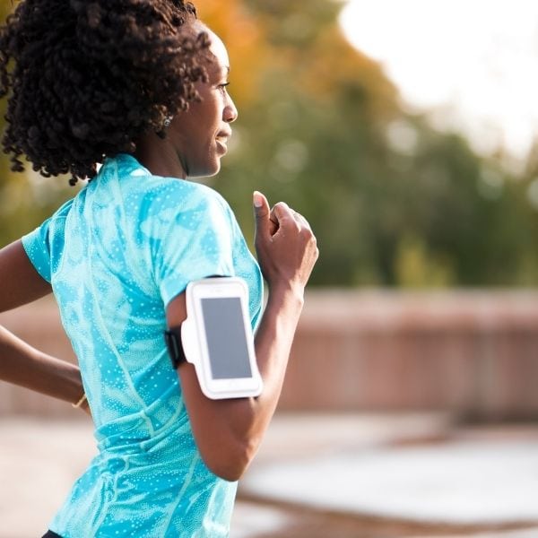 Woman exercising to improve her health in the long term