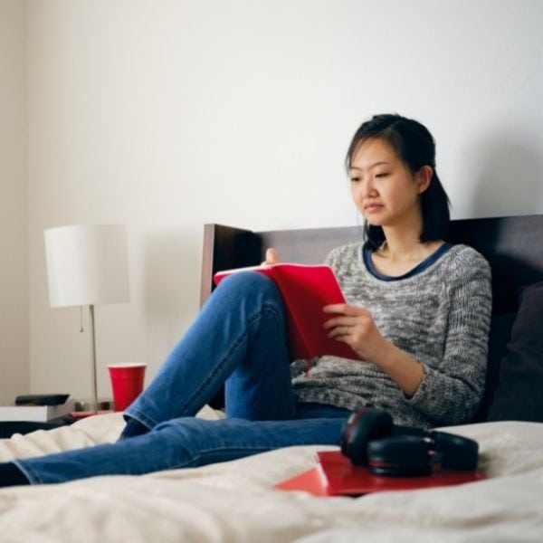 Woman writing in her journal