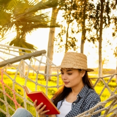 Woman reading a book for self-care