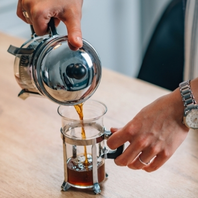 French press brewing a cup of Rasa in the morning