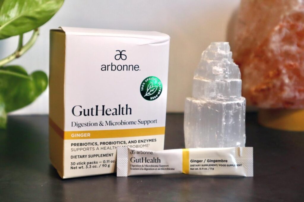 Styled Photoshoot of Arbonne Gut Health box and packet