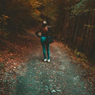 Woman wandering in the forest