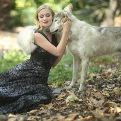 Woman and a wolf. Having a wild heart means that you follow your instincts (like a wolf)