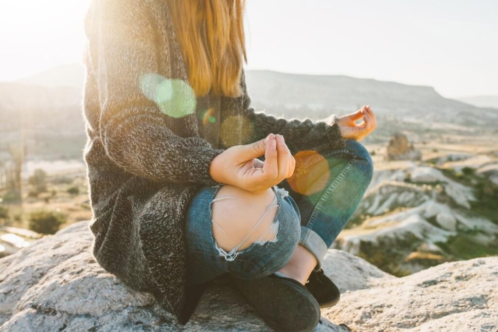 Woman meditating for developing clairsentience