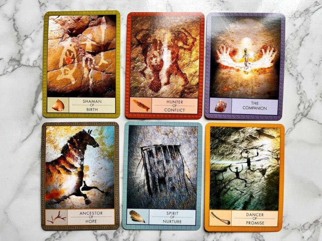 6 Sample cards from the Shaman's Oracle Deck: Shaman of Birth, Hunter of Conflict, The Companion, Ancestor of Hope, Spirit of Nurture, and Dancer of Promise.