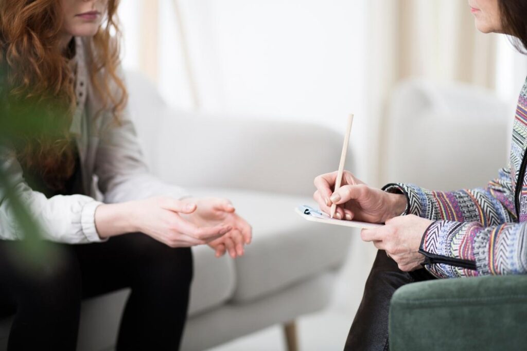 Cropped view of woman with her therapist