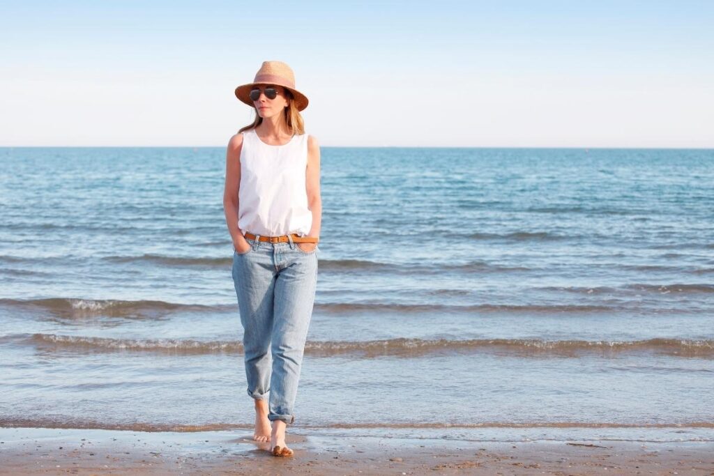 Mature woman walking on the beach