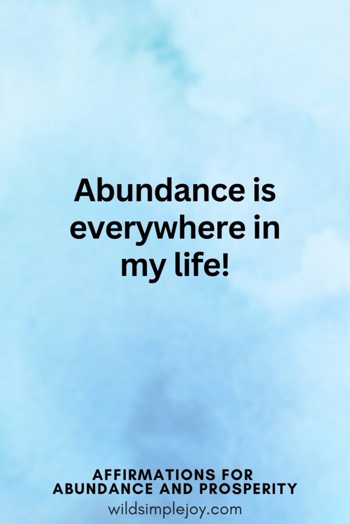 Vertical pin image with blue watercolor background and text overlay, Abundance is everywhere in my life! Affirmations for Abundance and Prosperity
