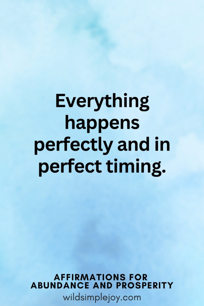 Vertical pin image with blue watercolor background and text overlay, Everything happens in perfect timing. Affirmations for Abundance and Prosperity