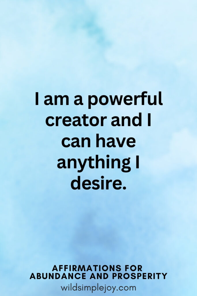Vertical pin image with blue watercolor background and text overlay, I am a powerful creator and I can have anything I desire. Affirmations for Abundance and Prosperity