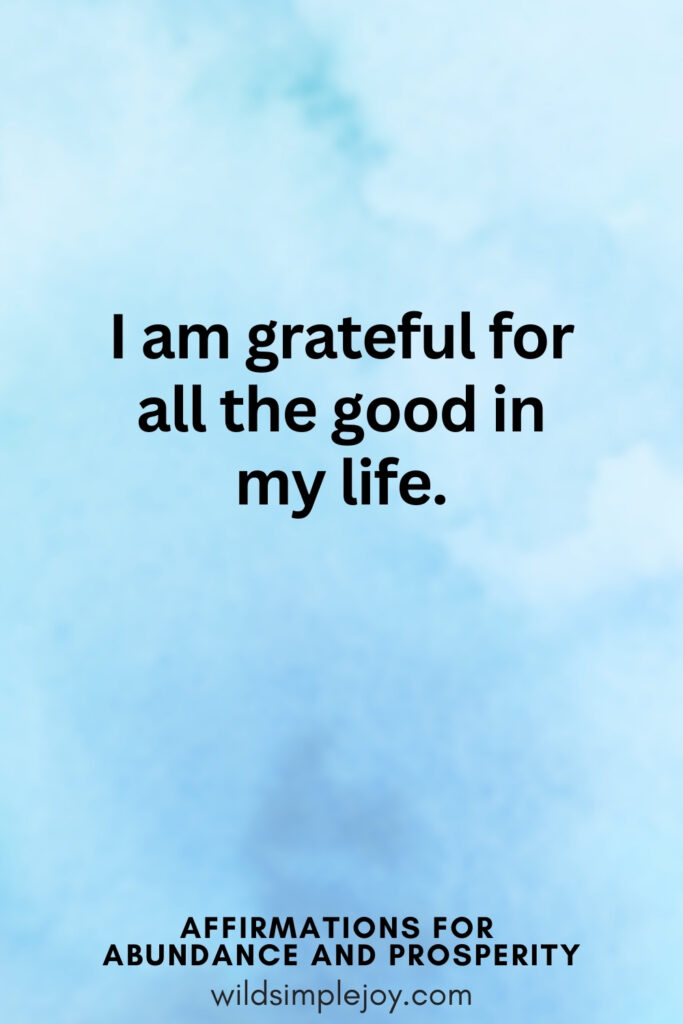 Vertical pin image with blue watercolor background and text overlay, I am grateful for all the good in my life. Affirmations for Abundance and Prosperity