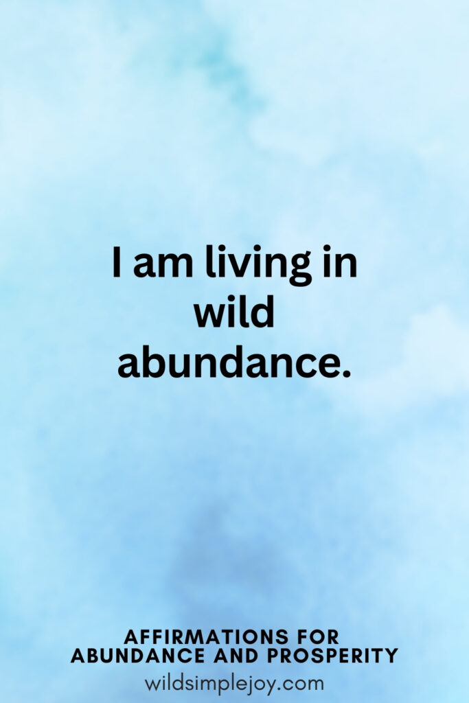 Vertical pin image with blue watercolor background and text overlay, I am living in wild abundance! Affirmations for Abundance and Prosperity