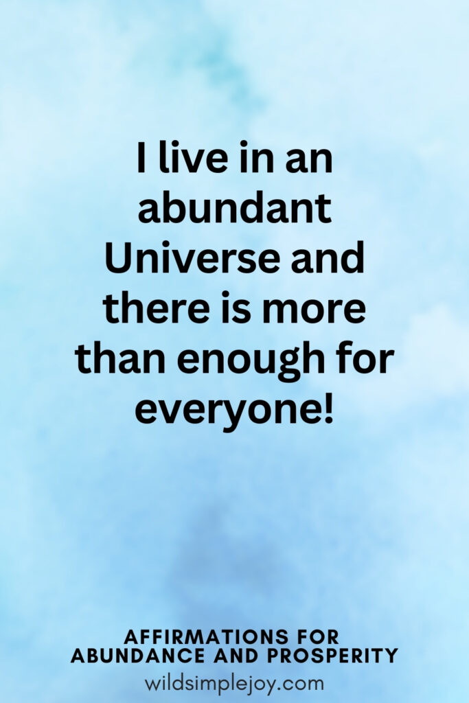 Vertical pin image with blue watercolor background and text overlay, I live in an abundance Universe! Affirmations for Abundance and Prosperity