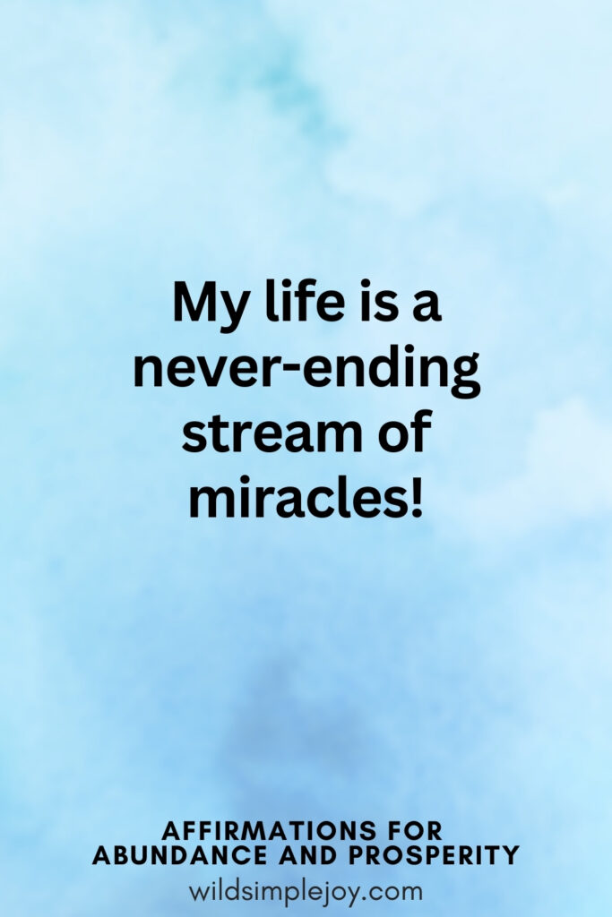 Vertical pin image with blue watercolor background and text overlay, My life is a never-ending stream of miracles! Affirmations for Abundance and Prosperity