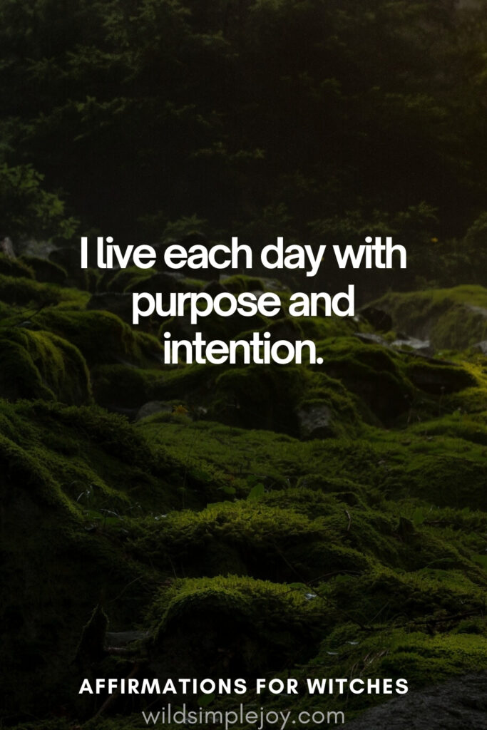 Vertical pin image with dark green background and text overlay, I live each day with purpose and intention. Magickal Affirmations wildsimplejoy.com