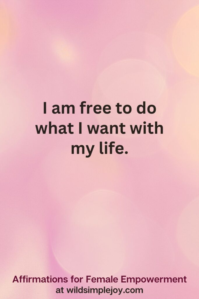 Vertical pin image with pink bokeh light background and text overlay, I am free to do what I want with my life. Affirmations for Female Empowerment at wildsimplejoy.com