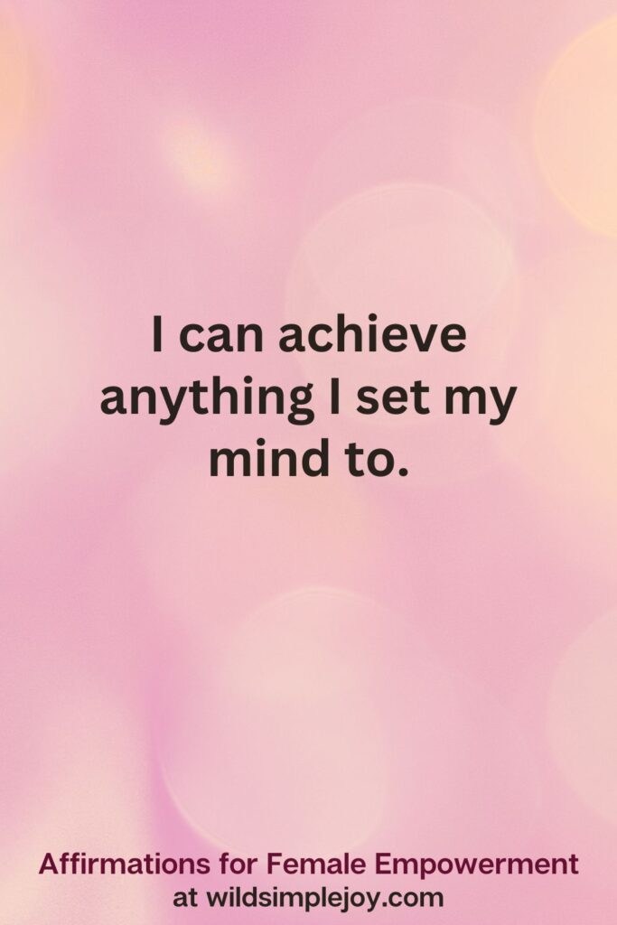 Vertical pin image with pink bokeh light background and text overlay, I can achieve anything I set my mind to. Affirmations for Female Empowerment at wildsimplejoy.com