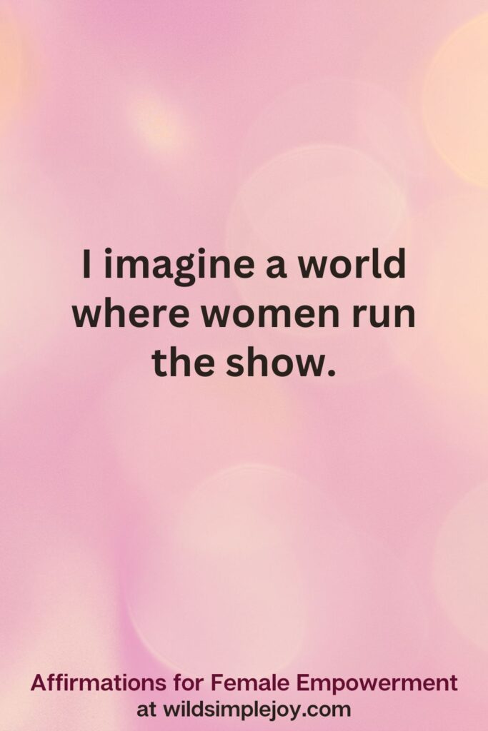 Vertical pin image with pink bokeh light background and text overlay, I imagine a world where women run the show. Affirmations for Female Empowerment at wildsimplejoy.com
