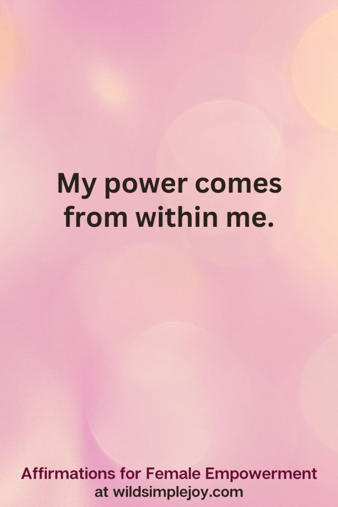 Vertical pin image with pink bokeh light background and text overlay, My power comes from within me. Affirmations for Female Empowerment at wildsimplejoy.com