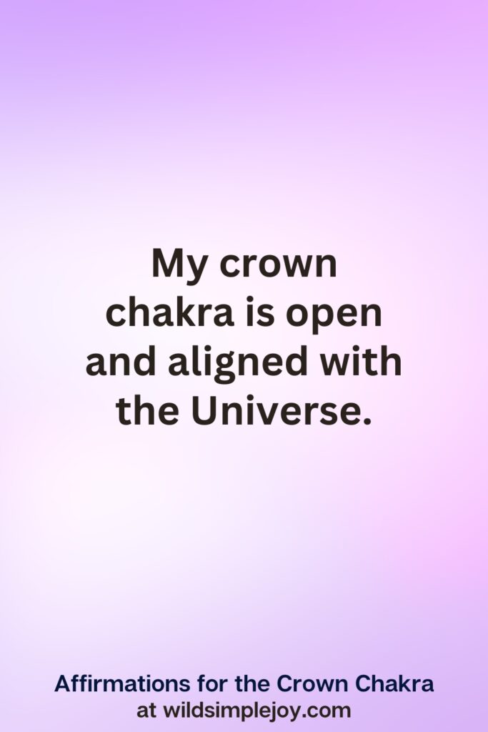 Vertical pin image with purple background and text overlay, Affirmations for the Crown Chakra at wildsimplejoy.comMy crown chakra is aligned to the universe.