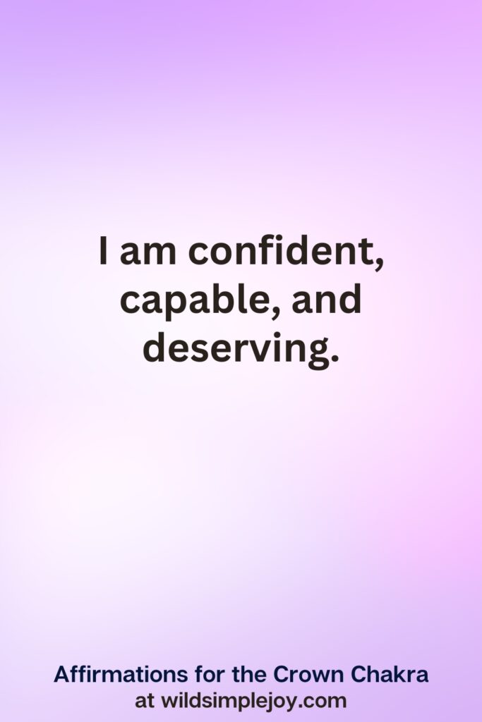 Vertical pin image with purple background and text overlay, I am confident, capable and deserving Affirmations for the Crown Chakra at wildsimplejoy.com