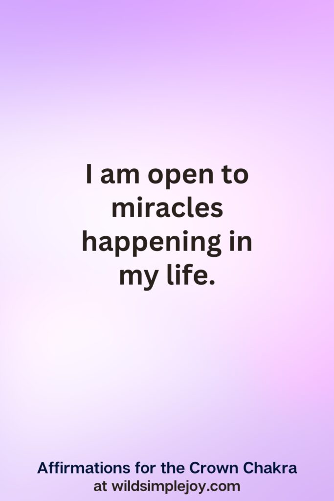 Vertical pin image with purple background and text overlay, I am open to miracles. Affirmations for the Crown Chakra at wildsimplejoy.com