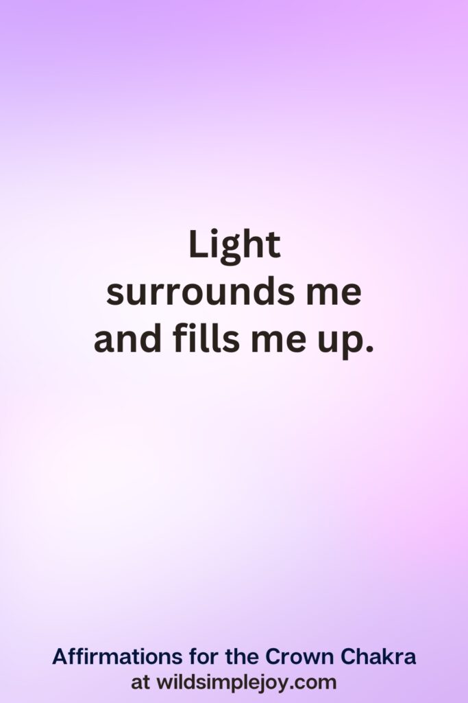 Vertical pin image with purple background and text overlay, Light surrounds me and fills me up. Affirmations for the Crown Chakra at wildsimplejoy.com