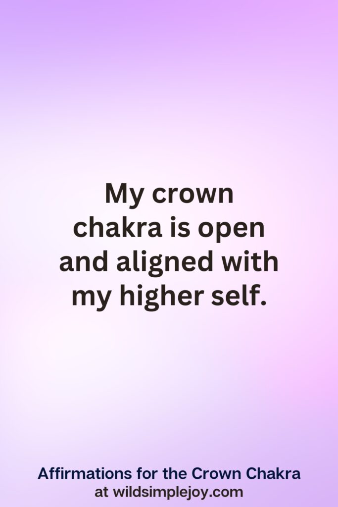 Vertical pin image with purple background and text overlay, My crown chakra is open and aligned with my higher self.Crown Chakra Affirmations at wildsimplejoy.com