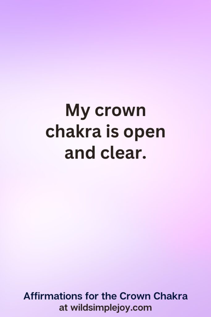 Vertical pin image with purple background and text overlay, My crown chakra is open and clear. Crown Chakra Affirmations at wildsimplejoy.com