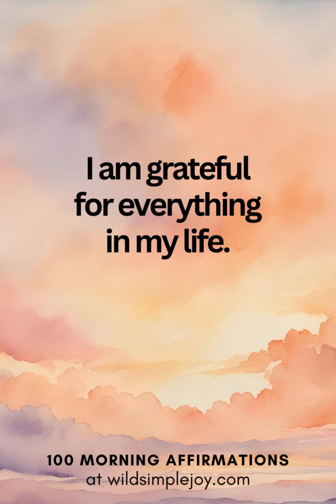 Vertical pin image with watercolor background and text overlay, I am grateful for everything in my life. Morning Affirmations at wildsimplejoy.com